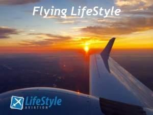 Diamond DA42 wing at sunset